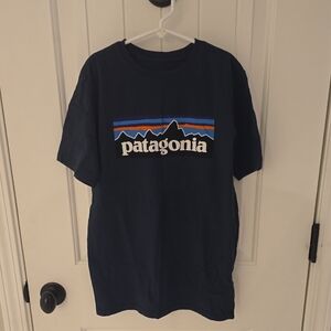Patagonia Dark Blue Tee with Vibrant Logo
